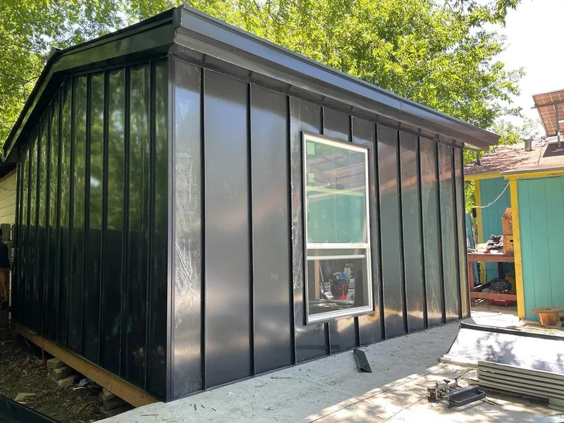 Black standing seam metal wall panels for Roof Inspection in Gresham Park